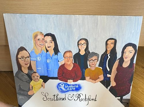 Hand painted picture of Bluebird Care care staff