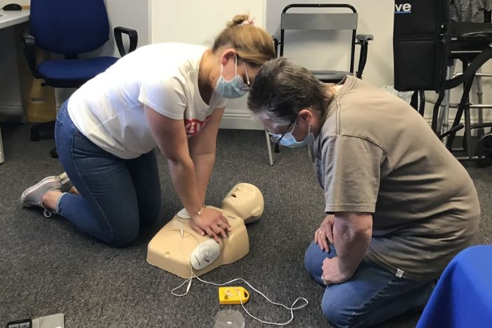 A Bluebird Care Worthing carer in CPR training