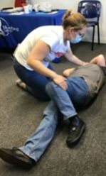 A carer doing moving and handling training